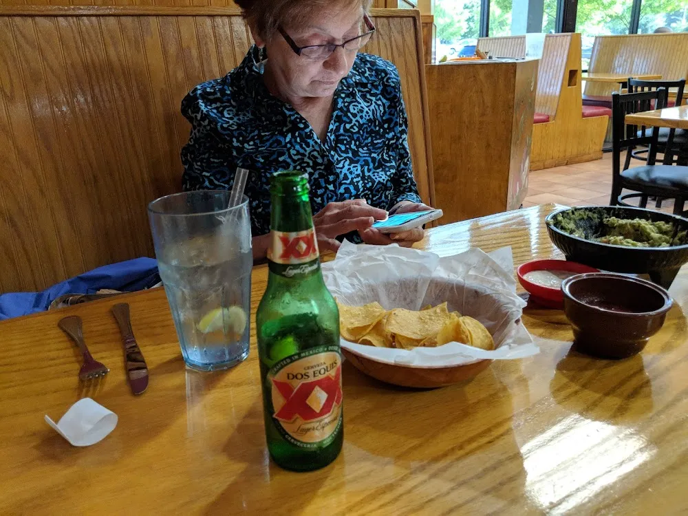 Guacamole Dip Chips and Salsa Dos Exquis Beer